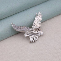 silver eagle brooch
majestic bird pin