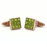 metalcolor:rose Pair of peridot gemstone cufflinks on a white background