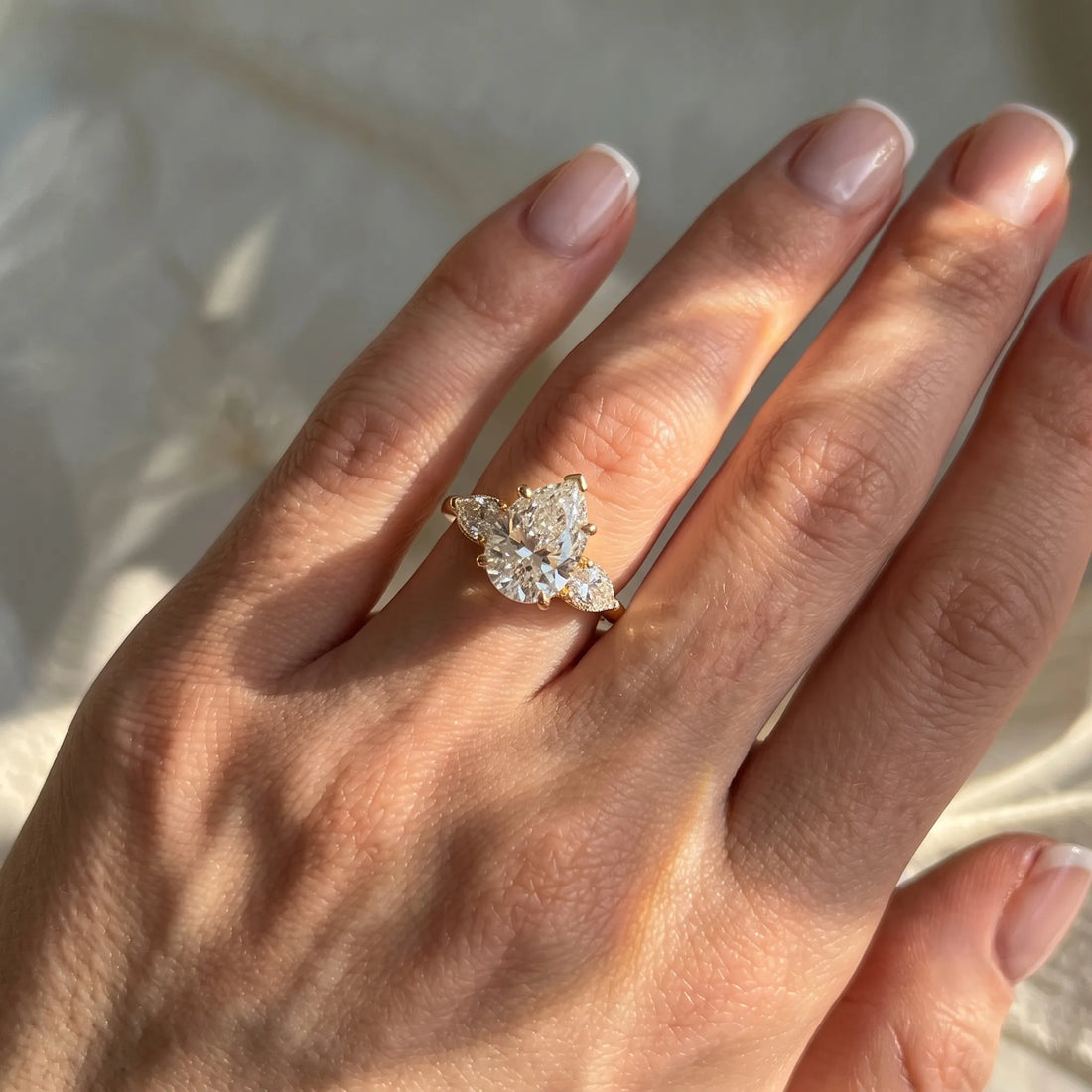 OctaPearl 3 ct Pear Cut Lab Grown Diamond Three Stone Engagement Ring