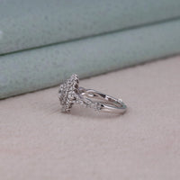 Silver ring with intricate design on a light background, Romantic Starburst Cubic Zirconia Engagement Ring, Affordable CZ Halo Wedding Anniversary Ring