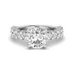 Diamond ring with a central gemstone and smaller diamonds on a white background