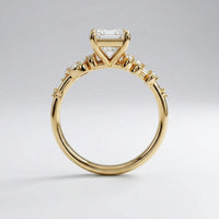 Gold ring with a diamond on a gray background