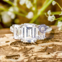 Tri-Stone Emerald Cut Bridal Ring With CZ Accent