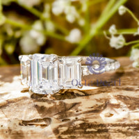 Tri-Stone Emerald Cut Bridal Ring With CZ Accent