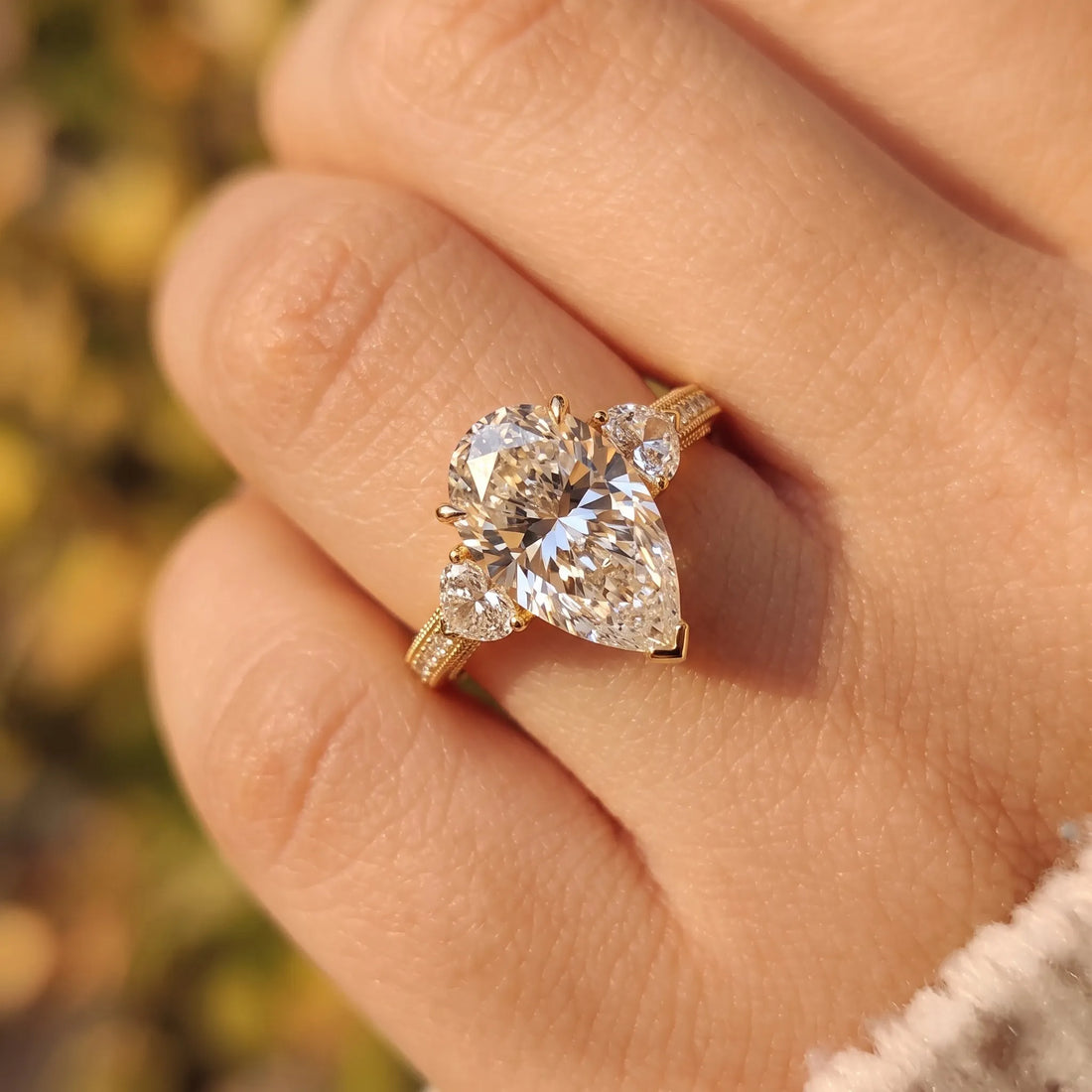 OctaPearl 6.50 ct Pear Three Stone Pave Lab Grown Diamond Cocktail Ring