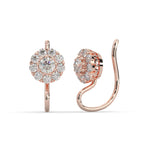 Rose gold earrings with diamond accents on a white background
