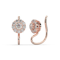 Rose gold earrings with diamond accents on a white background