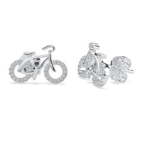 Silver bicycle-shaped earrings on a white background, Round Moissanite Dainty Minimalist Bicycle Stud Earrings