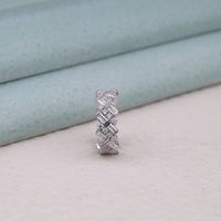 Silver ring with diamond accents on a light background, fashion ring, dainty moissanite ring, eternity ring for stacking, platinum eternity band, gold moissanite ring, white gold band, yellow gold eternity band, rose gold band, handmade jewelry, custom wedding band