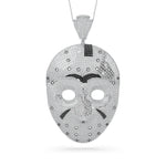 Mask-shaped pendant with black accents on a white background