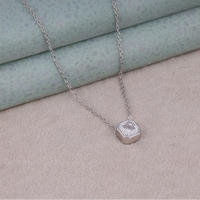 Silver necklace with a hexagonal pendant on a textured surface, Everyday Wear Colorless Moissanite Necklace, Affordable Asscher Cut Moissanite Wedding Gift, Timeless Solitaire Moissanite Pendant Necklace