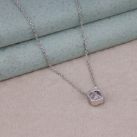 Silver necklace with a pendant on a textured surface, 14K Gold Bezel Set Moissanite Necklace, Unique Asscher Cut Minimalist Jewelry, Romantic Moissanite Necklace For Girlfriend