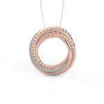 Rose gold necklace with interlocking rings on a white background