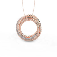 Rose gold necklace with interlocking rings on a white background
