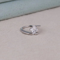 Silver ring with a large diamond on a light gray surface, Princess Cut Moissanite Ring, Tension Set Engagement Ring, Bypass Shank Moissanite Ring, Modern Solitaire Ring