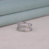 Two silver rings with small diamonds on a light surface, Round Cut Diamond & Moissanite Enhancer Band – Bridal Guard Wedding Ring