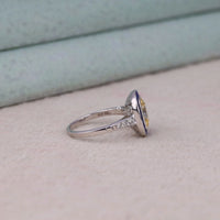 Silver ring with a gemstone on a light background, Antique Sapphire Halo Ring – Old Mine Cut CZ Art Deco Vintage Design Jewelry