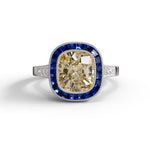 Ring with yellow diamond and blue gemstone on a white background, Antique Old Mine Cut CZ Stone Sapphire Halo Art Deco Vintage Ring – Classic Heirloom Inspired Jewelry