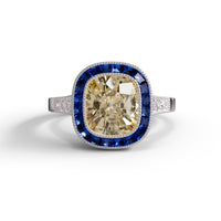 Ring with yellow diamond and blue gemstone on a white background, Antique Old Mine Cut CZ Stone Sapphire Halo Art Deco Vintage Ring – Classic Heirloom Inspired Jewelry