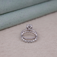 Silver ring with diamond accents on a textured surface, Solitaire Moissanite Engagement Ring Set with Full Eternity Wedding Band for Women