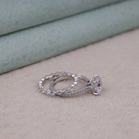 Silver ring with diamond on a light gray surface, Round Moissanite Solitaire Engagement Ring Set with Matching Eternity Wedding Band, Classic Solitaire Bridal Ring Set For Women