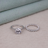 Two silver rings with gemstones on a light background, Round Moissanite Wedding Ring Set, Solitaire Engagement Ring with Eternity Band