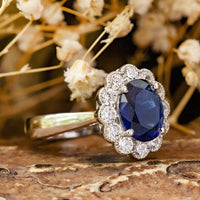 Oval Sapphire Engagement Ring with Diamond Floral Halo