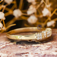 yellow gold moissanite ring