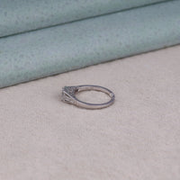 Silver ring with diamond on a textured surface, moissanite heirloom ring
art deco bridal jewelry