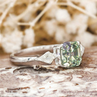 oval green stone wedding ring