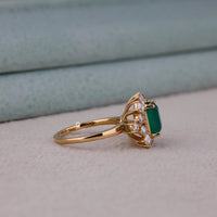Gold ring with a green gemstone and small diamonds on a light background, Green Emerald Cut CZ Solitaire Engagement Ring – 14K Gold Wedding Ring for Women