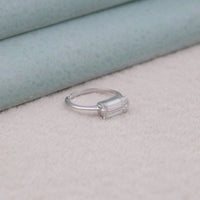 east west Moissanite ring, baguette cut Moissanite ring, Moissanite solitaire ring, modern solitaire ring, minimalist Moissanite jewelry, horizontal Moissanite setting