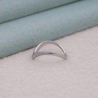 Silver ring with small stones on a light background, Dainty Pavé CZ Ring,CZ Curve Band for Engagement Ring
