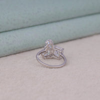 Silver ring with a star design on a light background, Multi Shape Five Stone Moissanite Band – Oval, Pear, Cushion & Round Wedding Ring