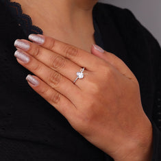 Pear Cut Moissanite Engagement Ring – Pavé Solitaire Silver Band