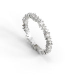 Silver ring with diamond accents on a white background, Round Moissanite Minimalist eternity Wedding Band For Women