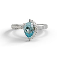 Ring with a heart-shaped blue gemstone on a white background, Green & Aqua Pear Cut Moissanite Half Halo Engagement & Wedding Ring, Two Stone Moissanite Toi Et Moi Ring,