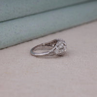 Silver ring with diamond details on a light surface, Glamorous Round Moissanite Art Deco Bridal Set, Symbolic Past Present Future Moissanite Ring