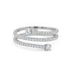 Silver ring with diamond accents on a white background