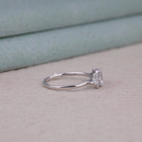 Silver ring with a diamond on a light background, Botanical Moissanite Engagement Ring, Leaf Design Oval Marquise Round Moissanite Ring