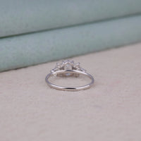 Silver ring with a diamond on a light background, Nature Theme Moissanite Ring, Leaf Shape Oval & Marquise Engagement Ring