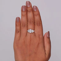 Diamond ring on a hand against a neutral background, Oval Marquise Round Moissanite Engagement Ring, Leaf Motif Wedding Ring for Women