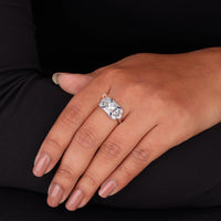 Close-up of a hand wearing a diamond ring on a black background, Vintage Blue Sapphire CZ Engagement Ring, Milgrain Art Deco Style Wedding Ring