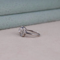 Silver ring with gemstones on a light gray surface, Vintage Inspired Milgrain Engagement Ring For Women, Elegant Blue Sapphire CZ And Round Stone Wedding Ring