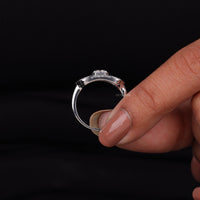 Silver ring held between fingers against a black background, Vintage Milgrain Engagement Ring for Women, Blue Sapphire Fancy CZ Art Deco Ring