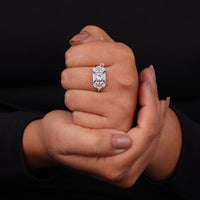 Close-up of a hand wearing a silver ring with a diamond on a black background, Antique Art Deco Engagement Ring with Sapphire & White CZ, Milgrain Wedding Ring