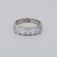 5-stones Emerald Cut Engagement Ring