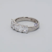 5-stones Emerald Cut Engagement Ring