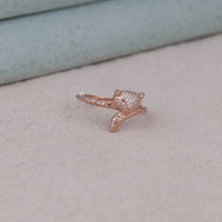 Rose gold ring with gemstones on a light gray surface, Stylish Everyday Wear Moissanite Ring, Eco Friendly Moissanite Animal Jewelry, Creative Fox Shaped Fashion Ring