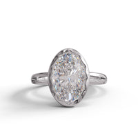 Diamond ring with a marquise-shaped gemstone on a white background, Bezel Set Split Shank Oval Solitaire Engagement Ring, Modern Wedding Ring for Women